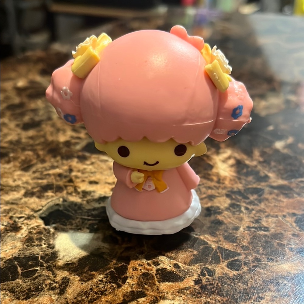 Adorable Pink Figurine Toy
